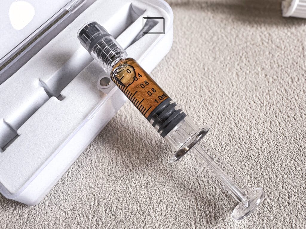 Distillat de CBD dans une seringue