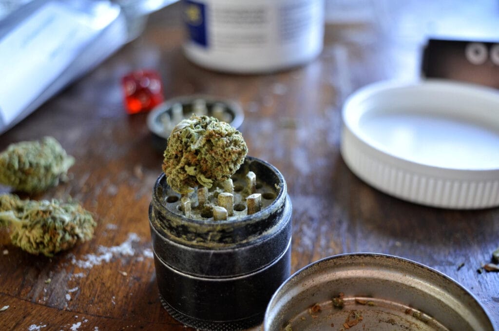 Grinder with flower