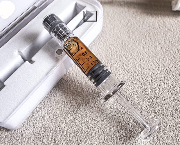 CBD Distillate in syringe