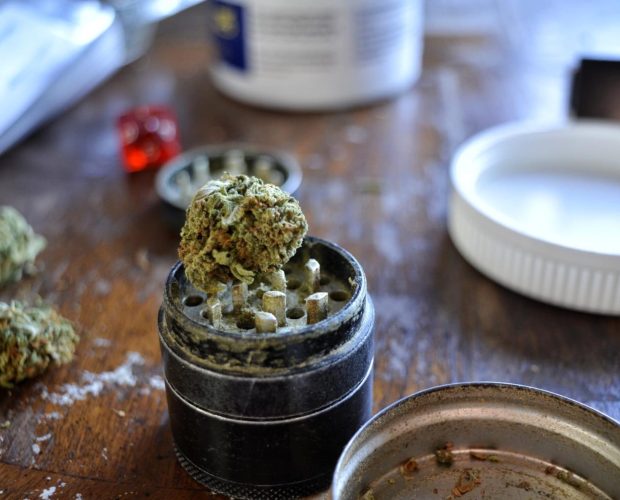 Grinder with flower